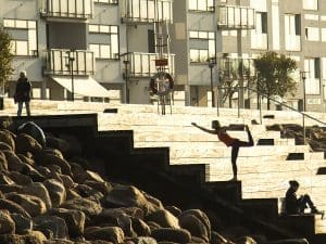 Yoga teacher doing corporate yoga on the harbor in Copenhagen
